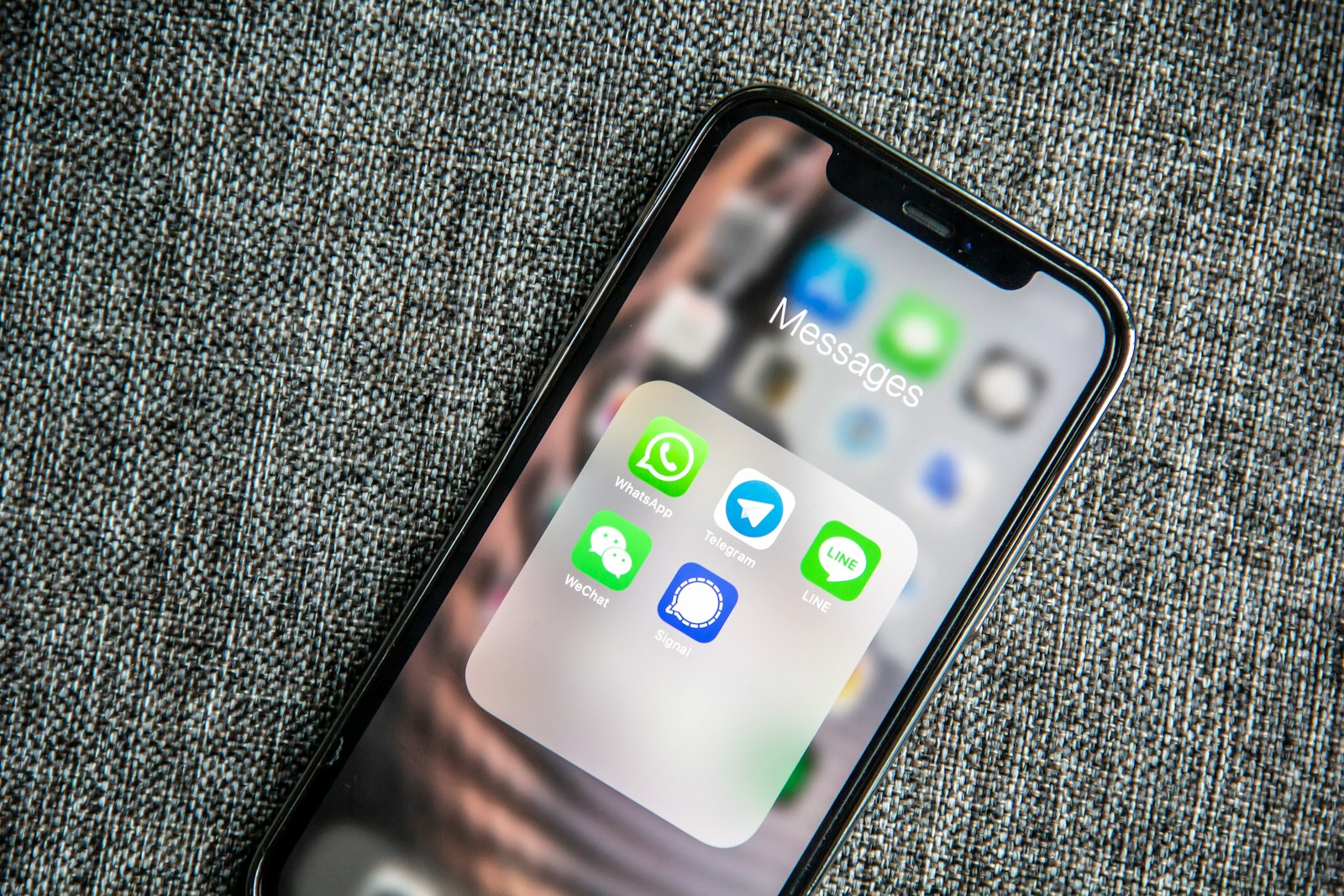 Messaging apps including WhatsApp on a smartphone